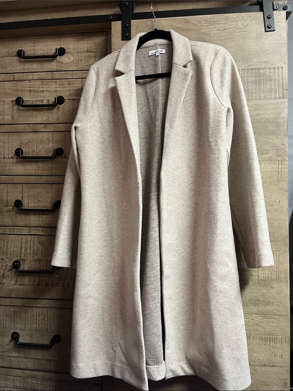 Women's Open-Front Long Coat in Light Beige and has pockets